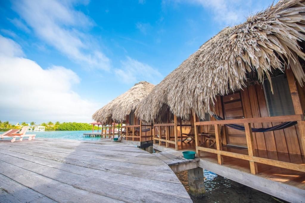 3-the-beach-at-st-george-Best-of-belize-2025-2026-overwater-thatched-roof-cabana-bungalo_20250306-163954_1